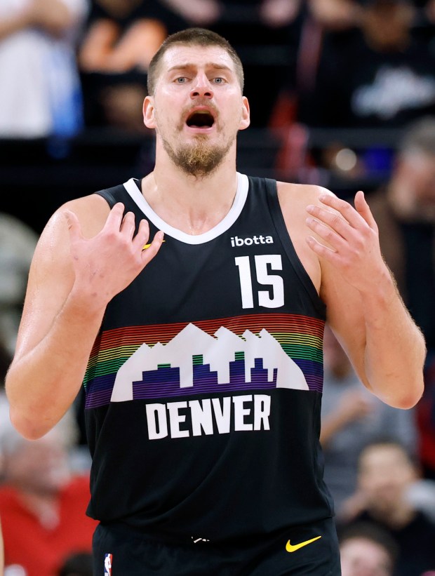 Denver Nuggets center Nikola Jokic reacts during the second half...