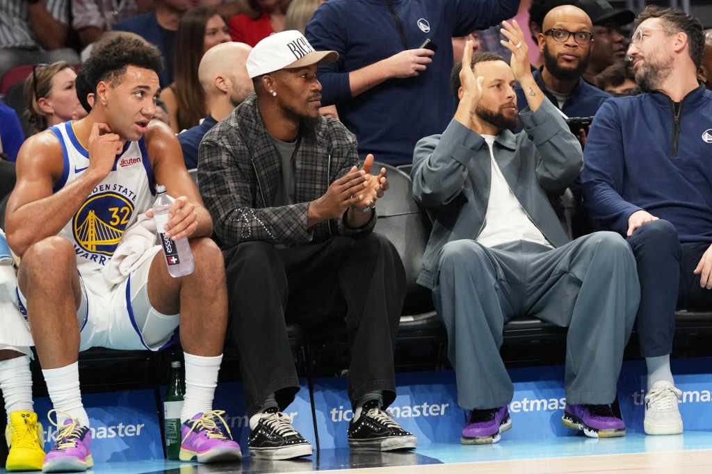 Short-handed Warriors battle without Curry, Butler and Green, but Miami surges late for 110-96 win