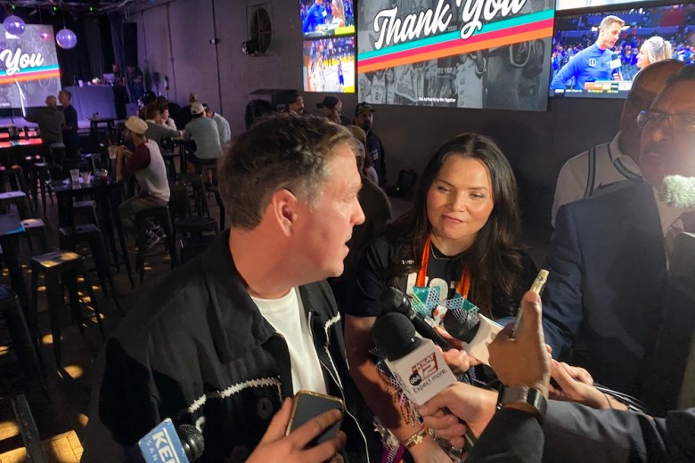 The Spurs' Peter Holt speaks to reporters after the team declared victory on Prop B.