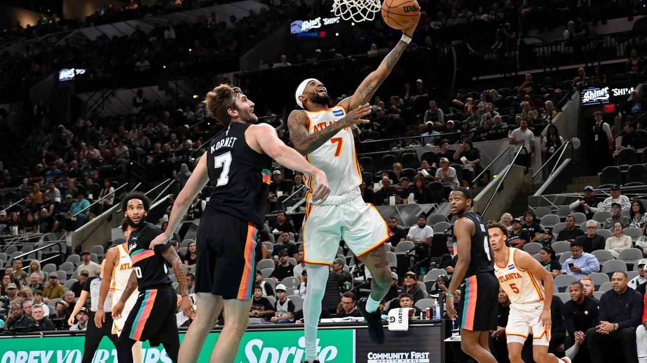 Fox, Johnson lead Spurs to third straight victory without Wembanyama, toppling Hawks 135-126