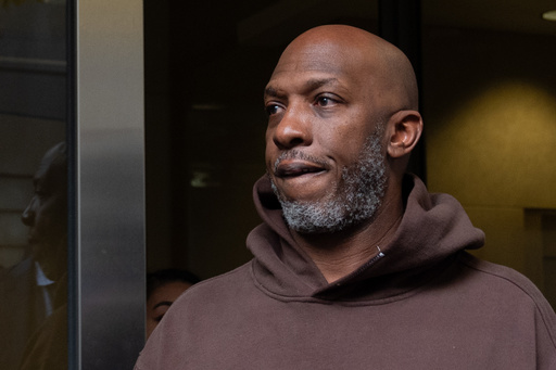FILE - Portland Trail Blazers head coach Chauncey Billups walks to a vehicle after his federal court appearance on Thursday, Oct. 23, 2025, in Portland, Ore. (AP Photo/Jenny Kane, File)