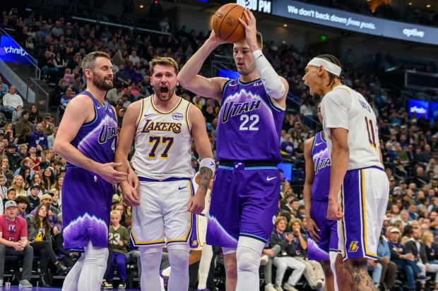 Lakers guard Luka Doncic (77) reacts to a made basket...