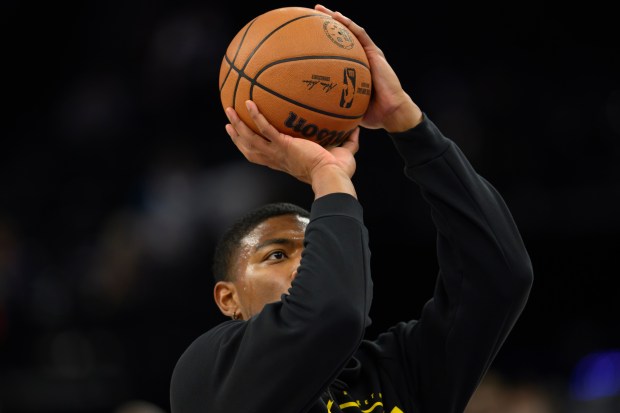 Lakers forward Rui Hachimura shoots during warmups before an NBA...