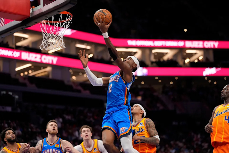 Nov 15, 2025; Charlotte, North Carolina, USA; Oklahoma City Thunder guard Shai Gilgeous-Alexander (2) goes to the basket against the Charlotte Hornets during the second half at Spectrum Center. Mandatory Credit: Jim Dedmon-Imagn Images