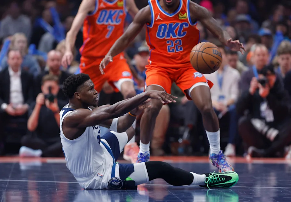Nov 26, 2025; Oklahoma City, Oklahoma, USA; Minnesota Timberwolves guard Anthony Edwards (5) passes after falling to the floor during a play against the Oklahoma City Thunder in the first quarter at Paycom Center. Mandatory Credit: Alonzo Adams-Imagn Images