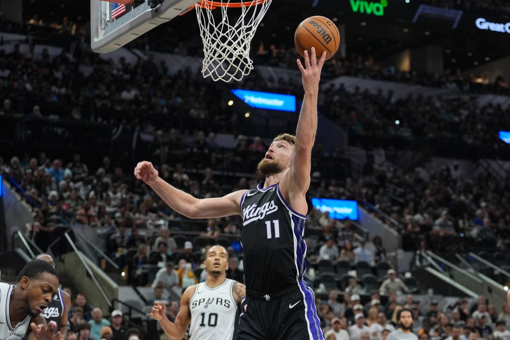 Sacramento Kings forward Domantas Sabonis (11) shoots in the second half against the San Antonio Spurs at Frost Bank Center. 