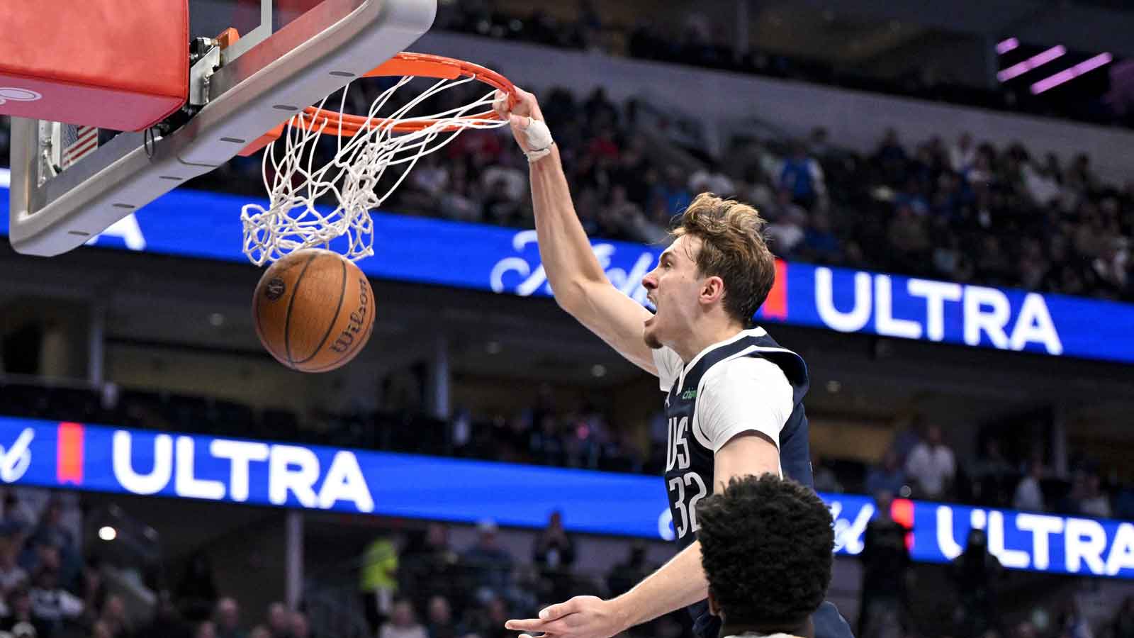 Dallas Mavericks head coach Jason Kidd and forward Cooper Flagg (32) look on during the second quarter against the LA Clippers in an NBA Cup game at the American Airlines Center.
