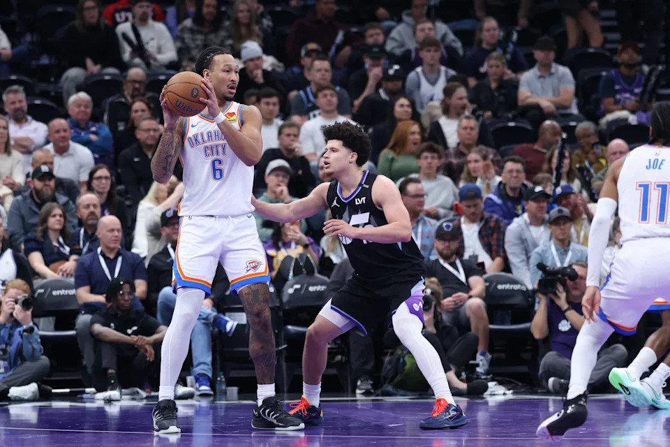 Nov 21, 2025; Salt Lake City, Utah, USA; Oklahoma City Thunder forward Jaylin Williams (6) looks for a play against Utah Jazz guard Walter Clayton Jr. (13) during the second half at Delta Center. Mandatory Credit: Rob Gray-Imagn Images