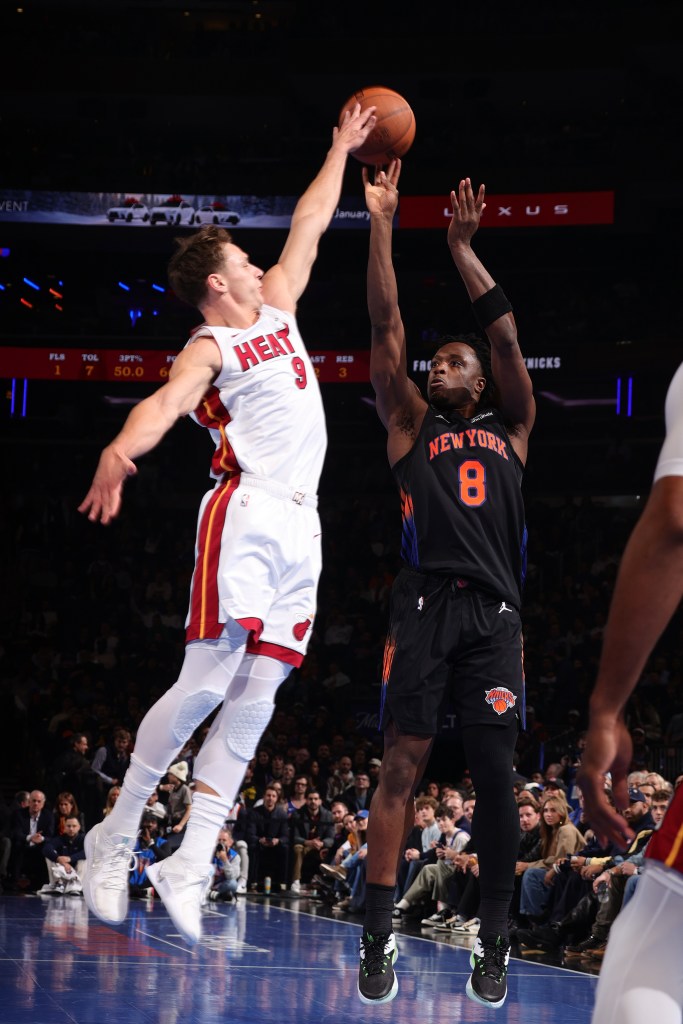 OG Anunoby #8 of the New York Knicks shoots the ball during the game against the Miami Heat during the 2025 - 2026 Emirates NBA Cup game on November 14, 2025 at Madison Square Garden.