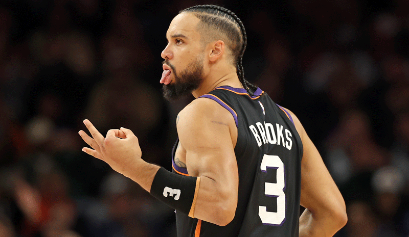 Phoenix Suns forward Dillon Brooks (3) celebrates a three point shot against the Minnesota Timberwolves in the first half of an NBA Cup game at Mortgage Matchup Center.