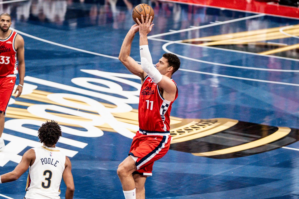 Los Angeles Clippers C Brook Lopez (11) shoots a fade away three during an NBA basketball game against the New Orleans Pelicans, Friday October 31st, 2025 in Inglewood, California. 