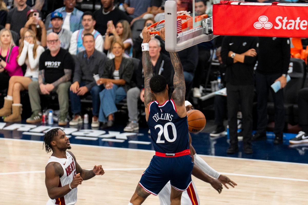 Los Angeles Clippers Forward John Collins (20) dunks the ball during an NBA basketball game against the Miami Heat, Monday November 3rd, 2025 in Los Angeles, California. 