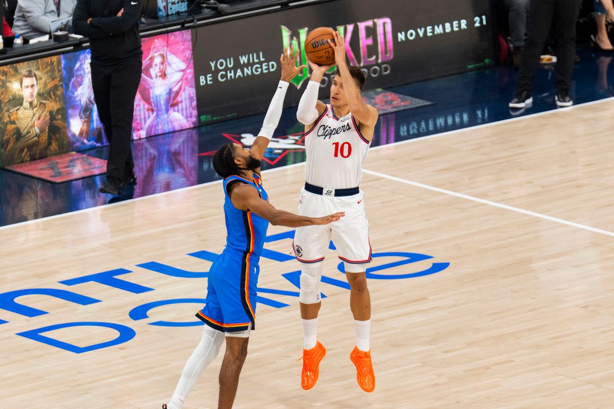 Los Angeles Clippers guard Bogdan Bogdanovic (1) takes a three during an NBA basketball game against the Oklahoma City Thunder, Tuesday November 4th, 2025 in Los Angeles, California. Los Angeles Clippers guard Bogdan Bogdanovic (1) takes a three during an NBA basketball game against the Oklahoma City Thunder, Tuesday November 4th, 2025 in Los Angeles, California.