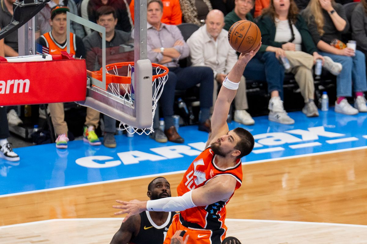 Los Angeles Clippers center Ivica Zubac (40) tips in the offensive rebound during an NBA basketball game against the Denver Nuggets, Tuesday November 12th, 2025 in Los Angeles, California.