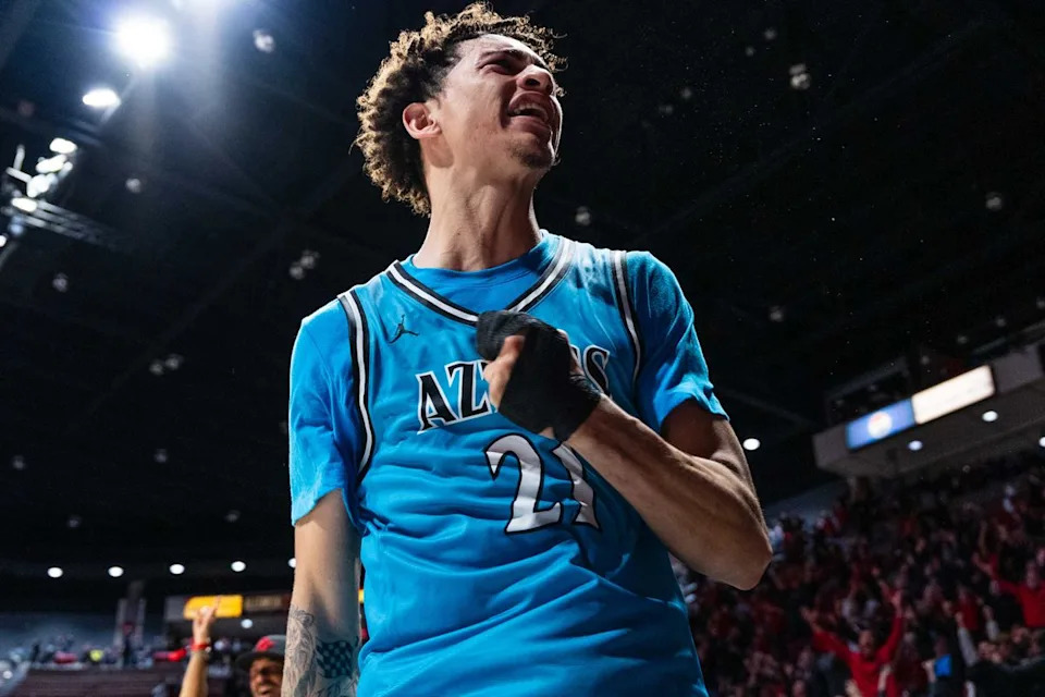 San Diego State guard Miles Byrd (21) reacts to hitting a game tying shot from half court during an NCAA Basketball game against Troy, Tuesday November 18, 2025 at Viejas Arena in San Diego, Calif.
