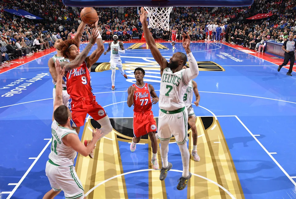 PHILADELPHIA, PA – OCTOBER 31: Kelly Oubre Jr. #9 of the Philadelphia 76ers drives to the basket as Jaylen Brown #7 and Payton Pritchard #11 of the Boston Celtics plays defense during the game during the 2025-26 Emirates Cup on October 31, 2025 at the Wells Fargo Center in Philadelphia, Pennsylvania NOTE TO USER: User expressly acknowledges and agrees that, by downloading and/or using this Photograph, user is consenting to the terms and conditions of the Getty Images License Agreement. Mandatory Copyright Notice: Copyright 2025 NBAE (Photo by Jesse D. Garrabrant/NBAE via Getty Images)