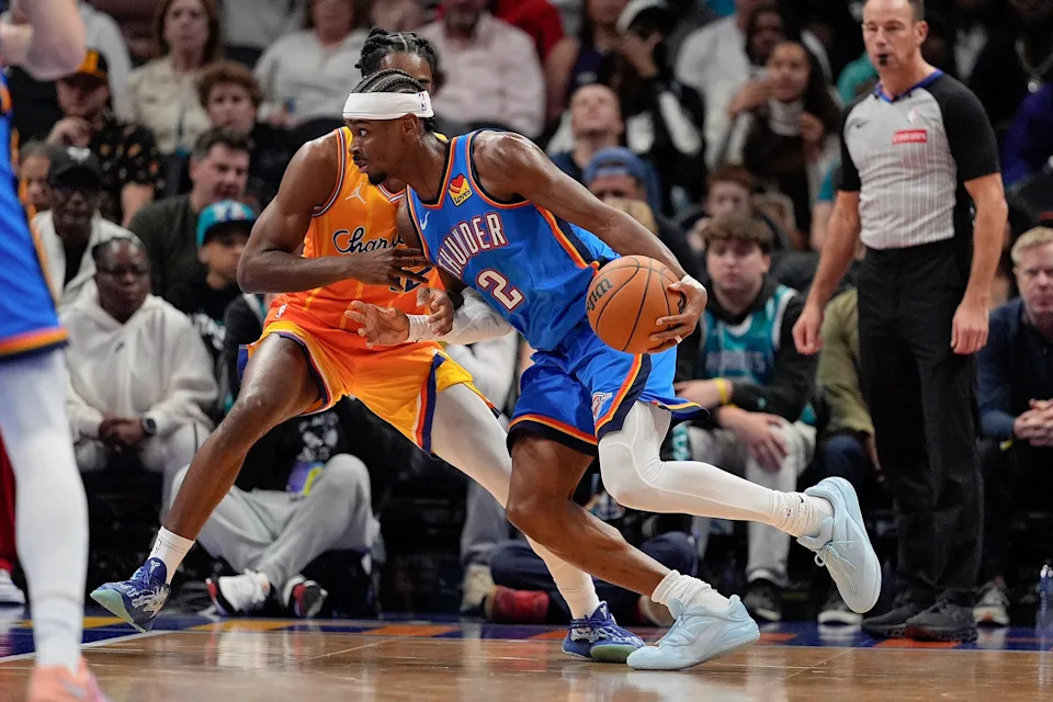 Nov 15, 2025; Charlotte, North Carolina, USA; Oklahoma City Thunder guard Shai Gilgeous-Alexander (2) drives to the basket against the Charlotte Hornets during the first half at Spectrum Center. Mandatory Credit: Jim Dedmon-Imagn Images