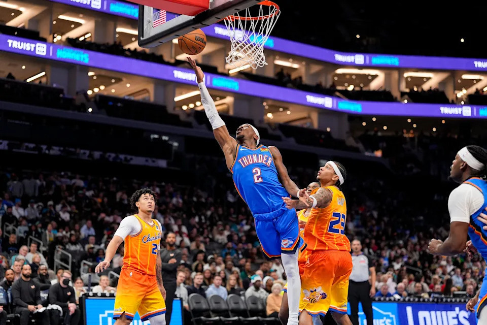 Nov 15, 2025; Charlotte, North Carolina, USA; Oklahoma City Thunder guard Shai Gilgeous-Alexander (2) drives to the basket against the Charlotte Hornets during the second half at Spectrum Center. Mandatory Credit: Jim Dedmon-Imagn Images