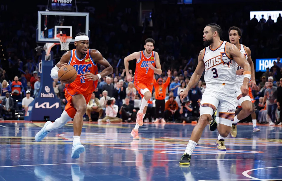 Nov 28, 2025; Oklahoma City, Oklahoma, USA; Oklahoma City Thunder guard Shai Gilgeous-Alexander (2) drives down the court beside Phoenix Suns forward Dillon Brooks (3) during the second half at Paycom Center. Mandatory Credit: Alonzo Adams-Imagn Images