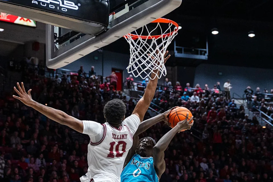 San Diego State forward Magoon Gwath (0) is fouled on a layup during an NCAA Basketball game against Troy, Tuesday November 18, 2025 at Viejas Arena in San Diego, Calif.
