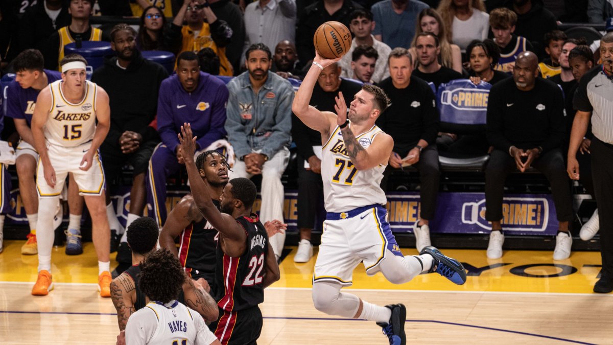 Doncic triple-double powers shorthanded Lakers past Heat, 130-120