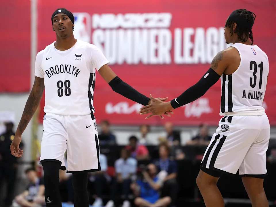 Jul 12, 2022; Las Vegas, NV, USA; Brooklyn Nets guard Donovan Williams (88) celebrates with guard Alondes Williams (31) during an NBA Summer League game at Cox Pavilion. Mandatory Credit: Stephen R. Sylvanie-USA TODAY Sports