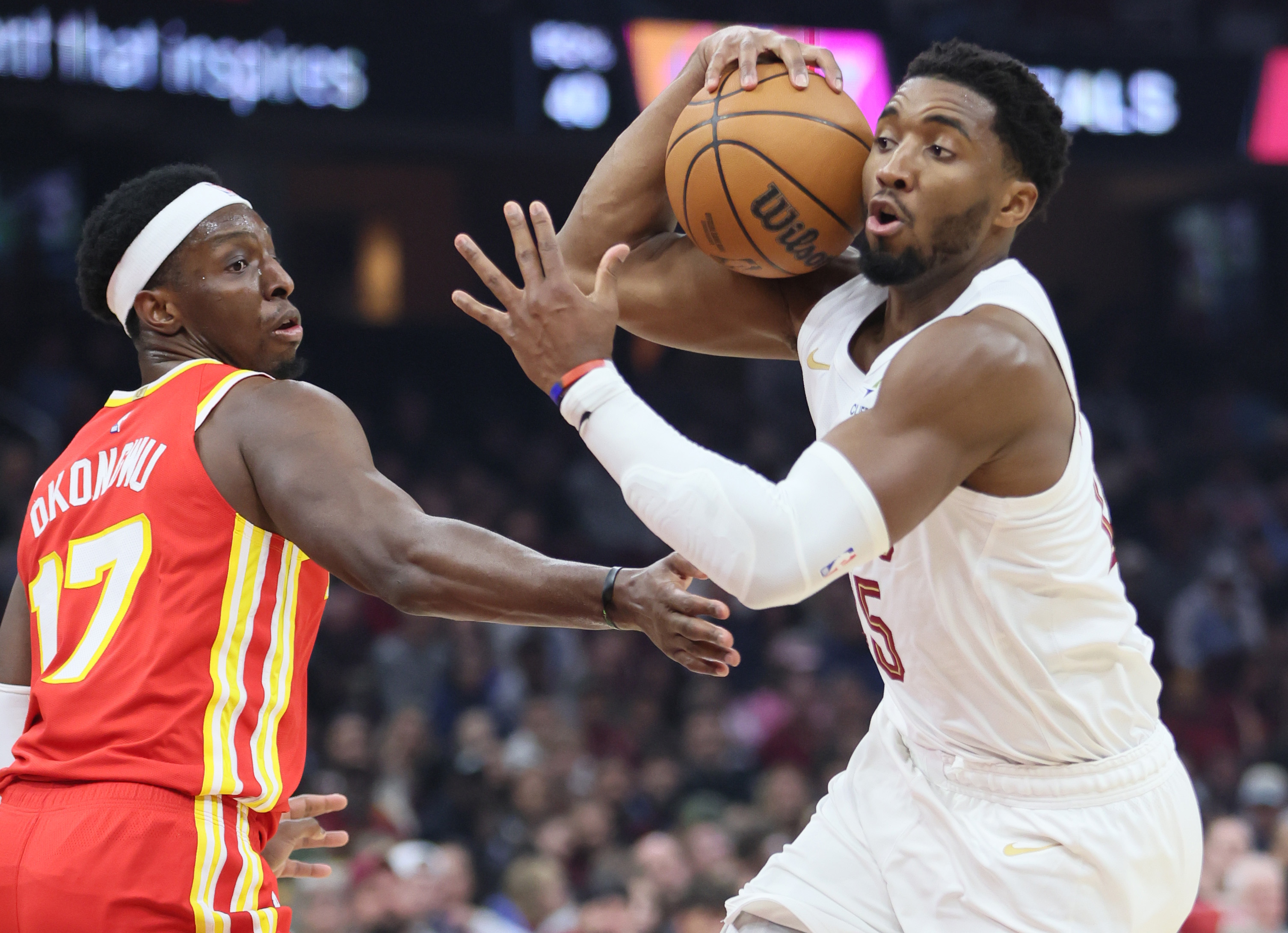 Cleveland Cavaliers guard Donovan Mitchell drives to the basket guarded by Atlanta Hawks forward Onyeka Okongwu in the first half at Rocket Arena. 