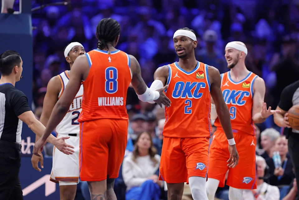 Nov 28, 2025; Oklahoma City, Oklahoma, USA; Oklahoma City Thunder guard Shai Gilgeous-Alexander (2) and guard Jalen Williams (8) high five after a play against the Phoenix Suns during the second quarter at Paycom Center. Mandatory Credit: Alonzo Adams-Imagn Images