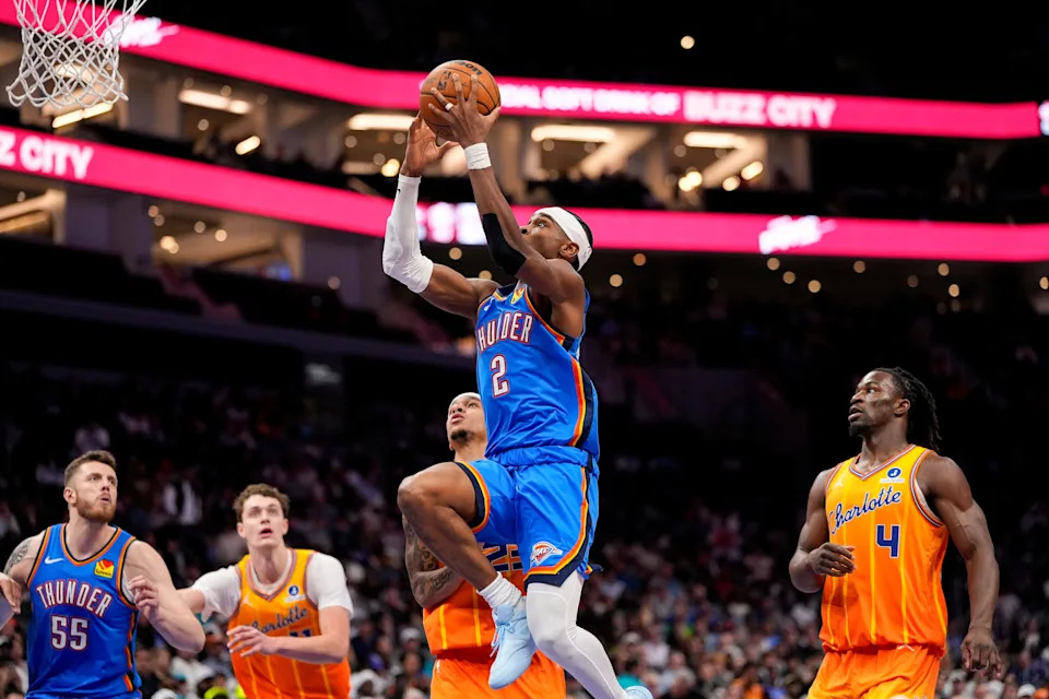 Nov 15, 2025; Charlotte, North Carolina, USA; Oklahoma City Thunder guard Shai Gilgeous-Alexander (2) drives to the basket against the Charlotte Hornets during the second half at Spectrum Center. Mandatory Credit: Jim Dedmon-Imagn Images