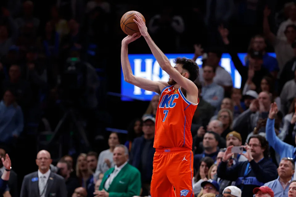 Nov 26, 2025; Oklahoma City, Oklahoma, USA; Oklahoma City Thunder center Chet Holmgren (7) shoots a three point basket against the Minnesota Timberwolves during the second half at Paycom Center. Mandatory Credit: Alonzo Adams-Imagn Images