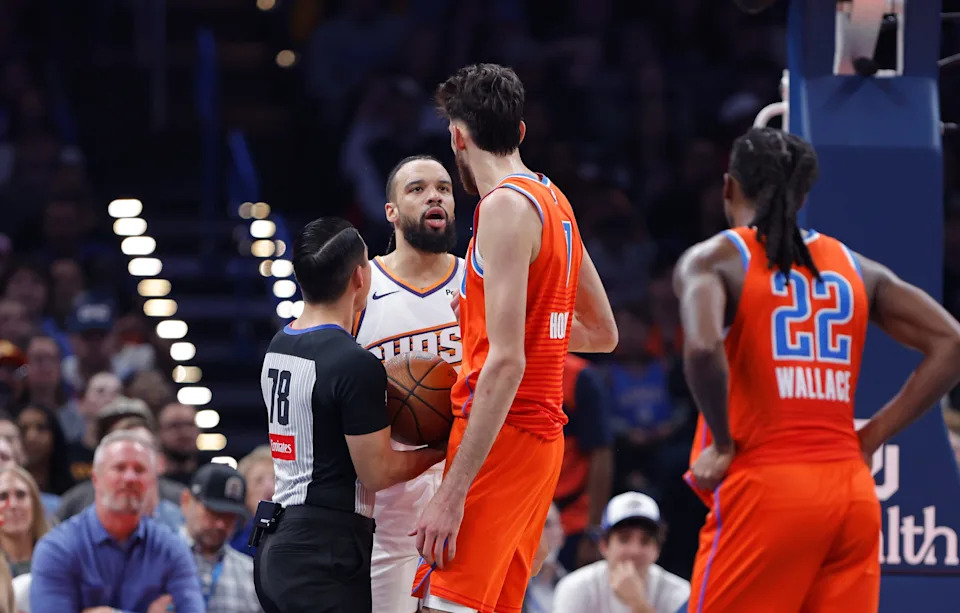 Nov 28, 2025; Oklahoma City, Oklahoma, USA; Phoenix Suns forward Dillon Brooks (3) and Oklahoma City Thunder center Chet Holmgren (7) exchange words during the second quarter at Paycom Center. Mandatory Credit: Alonzo Adams-Imagn Images