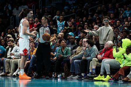 Josh Giddey reacts courtside after a heated exchange with a fan during the Bulls’ matchup against the Hornets at Spectrum Center
