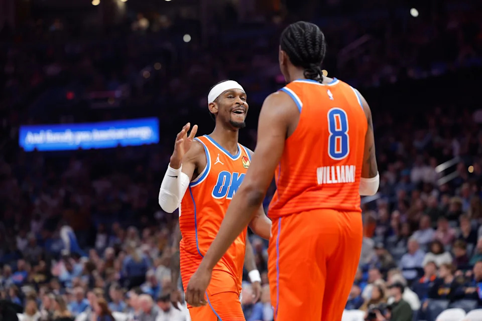 Nov 28, 2025; Oklahoma City, Oklahoma, USA; Oklahoma City Thunder guard Shai Gilgeous-Alexander (2) high fives guard Jalen Williams (8) after scoring against the Phoenix Suns during the second half at Paycom Center. Mandatory Credit: Alonzo Adams-Imagn Images
