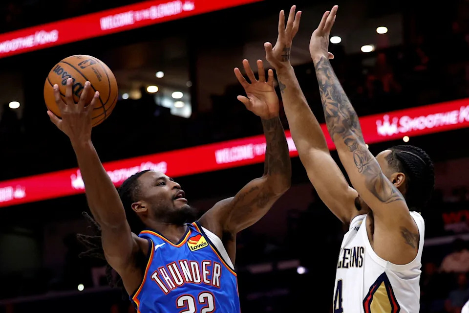NEW ORLEANS, LOUISIANA - NOVEMBER 17: Cason Wallace #22 of the Oklahoma City Thunder shoots over Hunter Dickinson #4 of the New Orleans Pelicans during the first quarter of the NBA game at Smoothie King Center on November 17, 2025 in New Orleans, Louisiana. NOTE TO USER: User expressly acknowledges and agrees that, by downloading and or using this photograph, User is consenting to the terms and conditions of the Getty Images License Agreement. (Photo by Sean Gardner/Getty Images)
