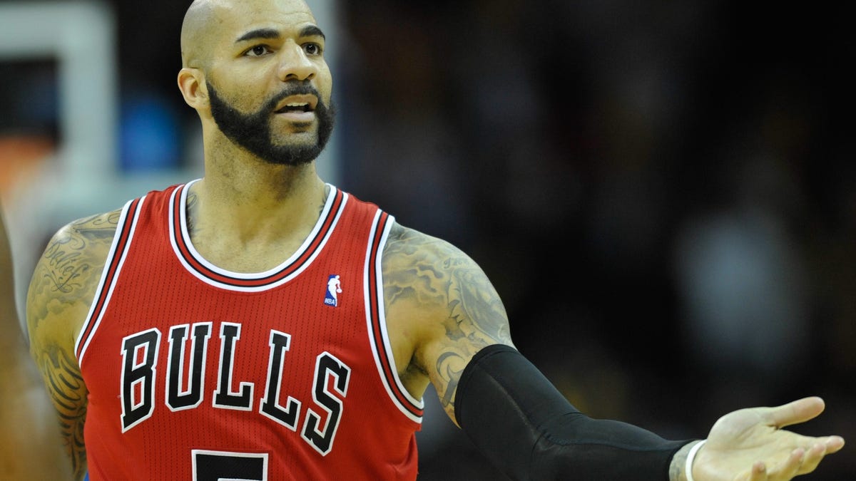 Carlos Boozer in stands for Duke basketball vs Arkansas