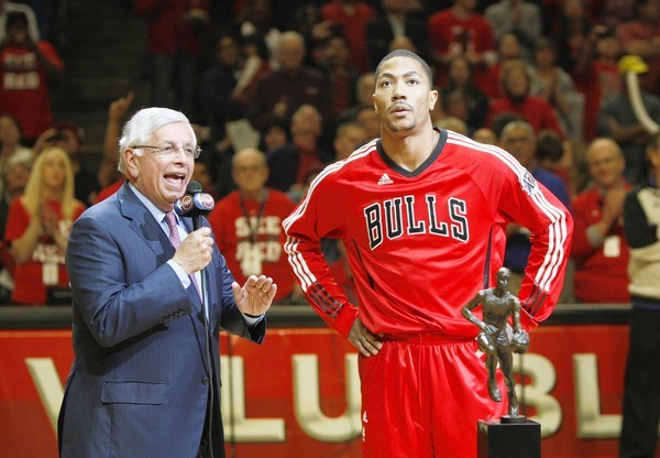 NBA commissioner David Stern presents Derrick Rose the MVP award before the start of Game 2.