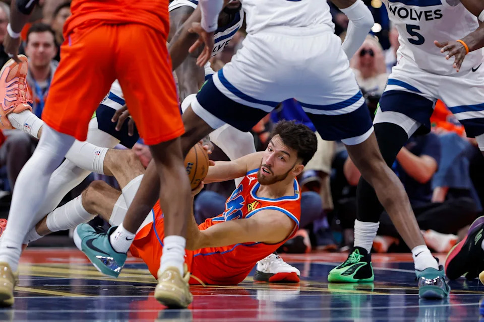 Nov 26, 2025; Oklahoma City, Oklahoma, USA; Oklahoma City Thunder center Chet Holmgren (7) fights for control of the ball against the Minnesota Timberwolves during the second half at Paycom Center. Mandatory Credit: Alonzo Adams-Imagn Images