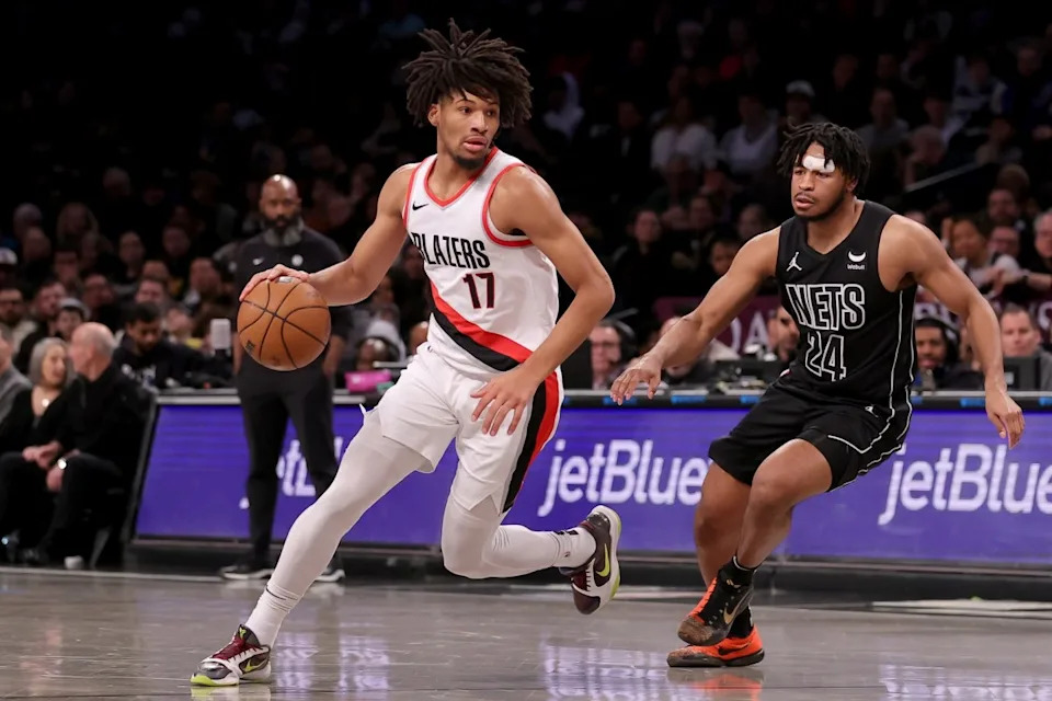 Portland Trail Blazers guard Shaedon Sharpe drives with the ball as Brooklyn Nets guard Cam Thomas defendsBrad Penner-Imagn Images