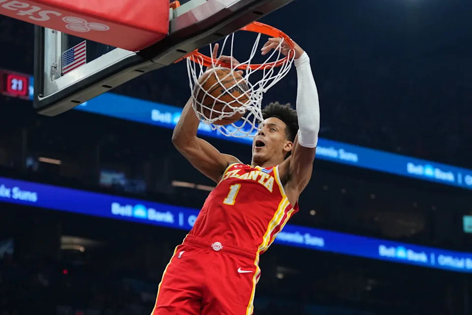 PHOENIX, ARIZONA - NOVEMBER 16: Jalen Johnson #1 of the Atlanta Hawks dunks against the Phoenix Suns during the first half at Mortgage Matchup Center on November 16, 2025 in Phoenix, Arizona. NOTE TO USER: User expressly acknowledges and agrees that, by downloading and or using this photograph, User is consenting to the terms and conditions of the Getty Images License Agreement. (Photo by Kelsey Grant/Getty Images)