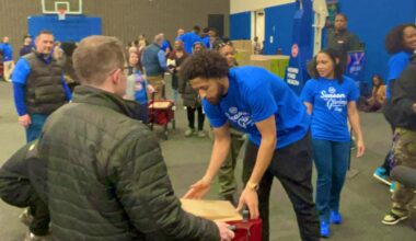 Pistons tip off 'Season of Giving' by distributing 1,200 food items and essentials