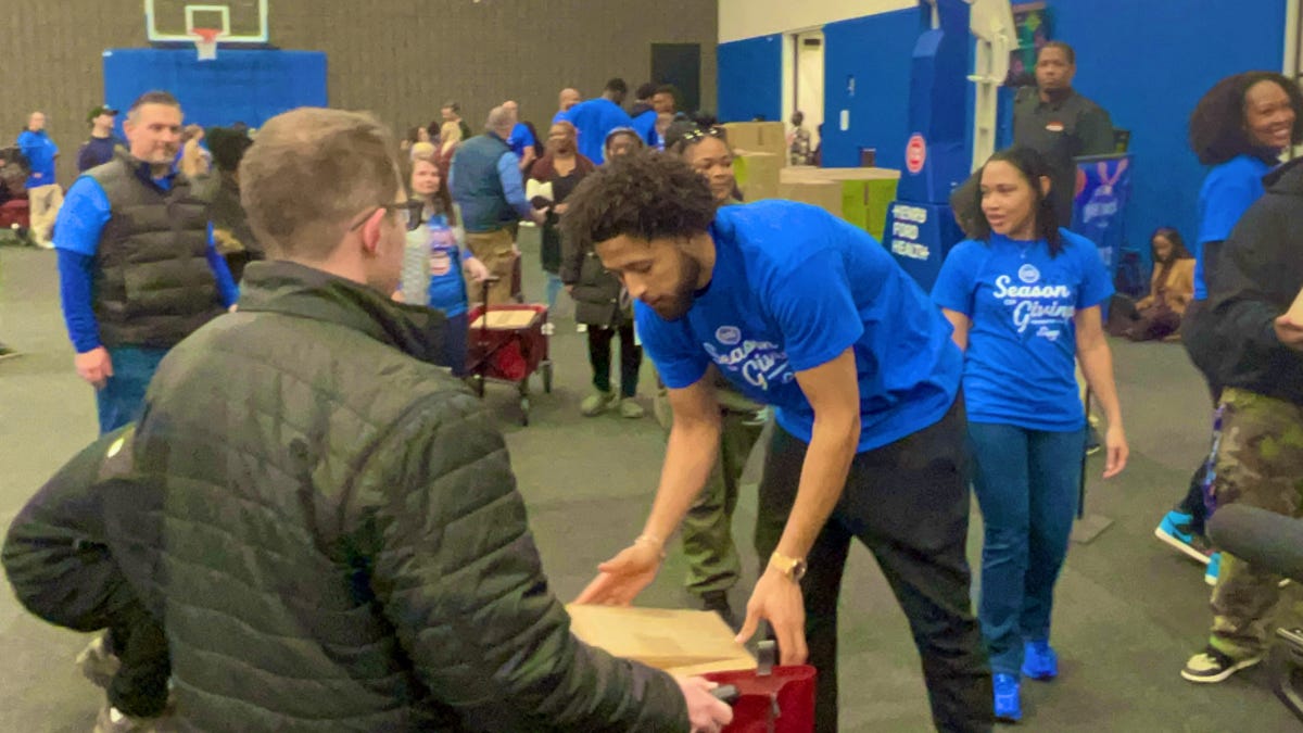 Pistons tip off 'Season of Giving' by distributing 1,200 food items and essentials