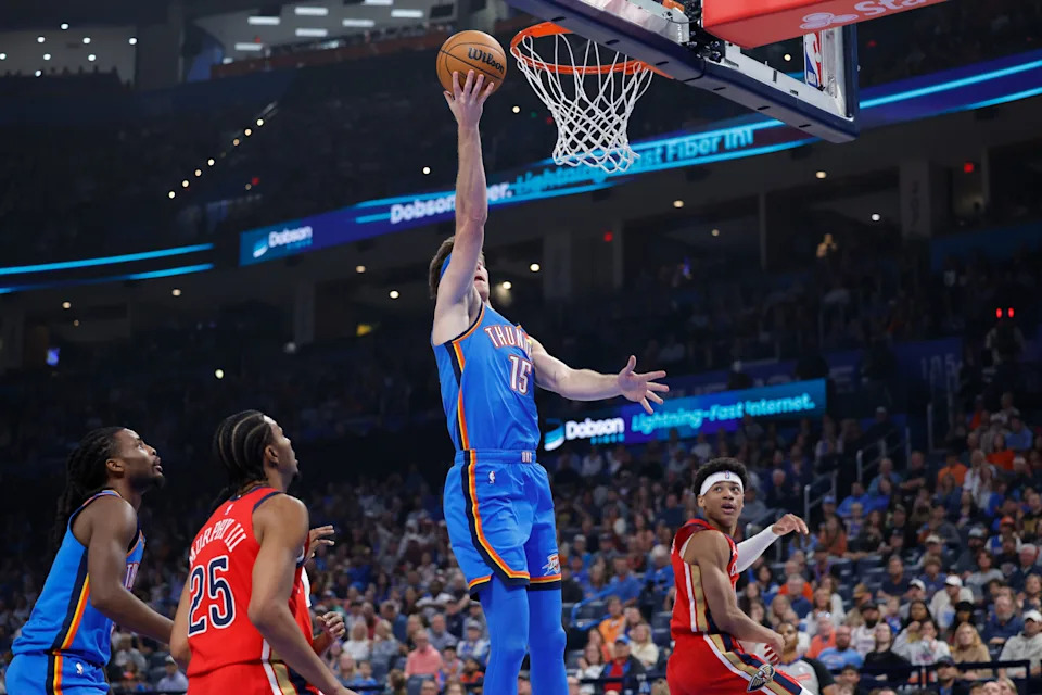 Nov 2, 2025; Oklahoma City, Oklahoma, USA; Oklahoma City Thunder center Branden Carlson (15) goes to the basket for a shot against the New Orleans Pelicans during the first quarter at Paycom Center. Mandatory Credit: Alonzo Adams-Imagn Images