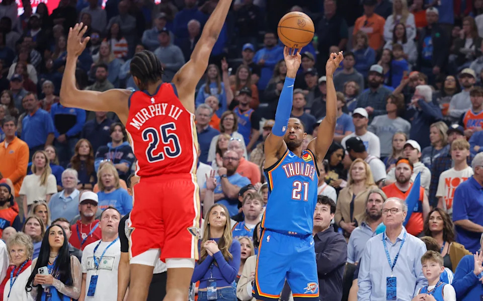 Nov 2, 2025; Oklahoma City, Oklahoma, USA; Oklahoma City Thunder guard Aaron Wiggins (21) shoots a 3-point basket against the New Orleans Pelicans during the first quarter at Paycom Center. Mandatory Credit: Alonzo Adams-Imagn Images