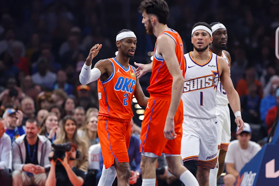 Nov 28, 2025; Oklahoma City, Oklahoma, USA; Oklahoma City Thunder guard Shai Gilgeous-Alexander (2) and center Chet Holmgren (7) high five after a play against the Phoenix Suns during the first quarter at Paycom Center. Mandatory Credit: Alonzo Adams-Imagn Images