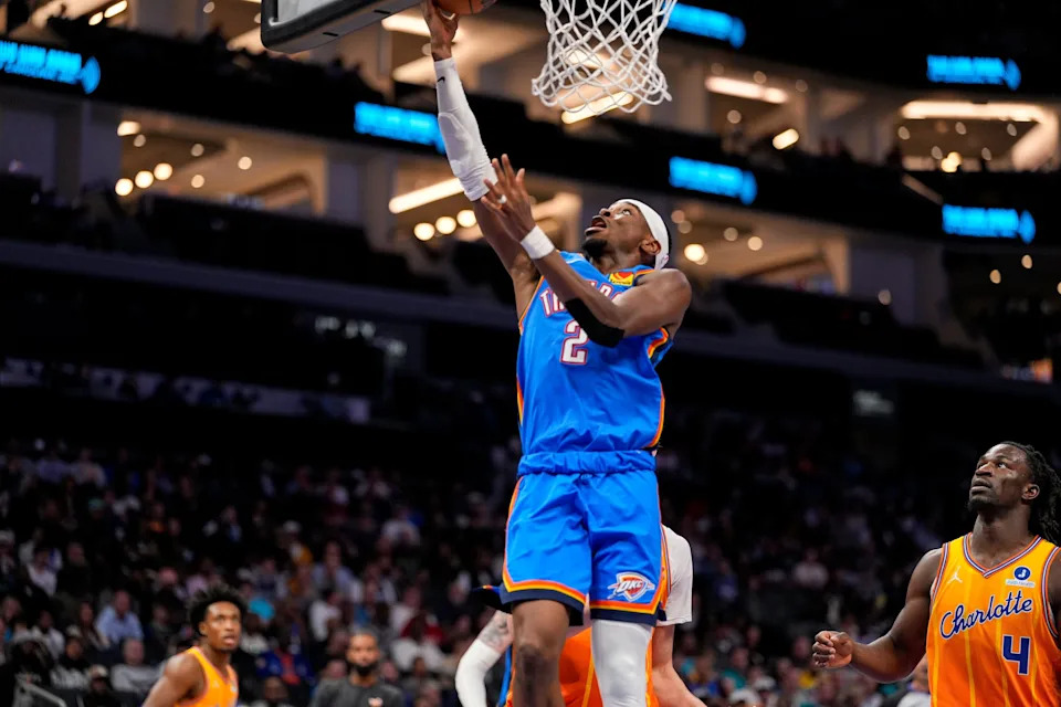 Nov 15, 2025; Charlotte, North Carolina, USA; Oklahoma City Thunder guard Shai Gilgeous-Alexander (2) drives to the basket against the Charlotte Hornets during the second half at Spectrum Center. Mandatory Credit: Jim Dedmon-Imagn Images