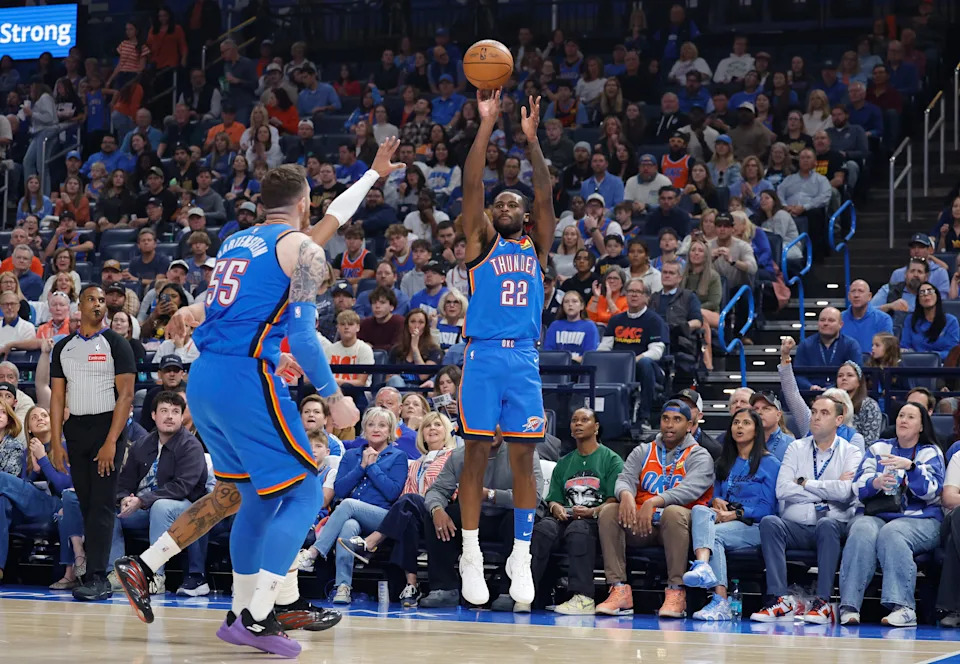 Nov 2, 2025; Oklahoma City, Oklahoma, USA; Oklahoma City Thunder guard Cason Wallace (22) shoots a three point basket against the New Orleans Pelicans during the first quarter at Paycom Center. Mandatory Credit: Alonzo Adams-Imagn Images