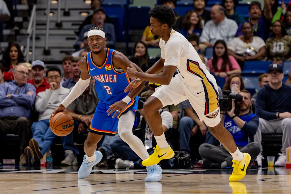Nov 17, 2025; New Orleans, Louisiana, USA; Oklahoma City Thunder guard Shai Gilgeous-Alexander (2) dribbles against New Orleans Pelicans forward Herbert Jones (2) during the first half at Smoothie King Center. Mandatory Credit: Stephen Lew-Imagn Images