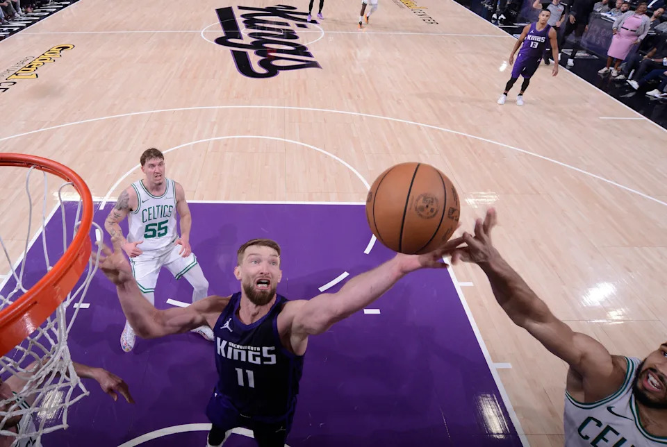 SACRAMENTO, CA – MARCH 24: Domantas Sabonis #11 of the Sacramento Kings and Jayson Tatum #0 of the Boston Celtics fight for the rebound during the game on March 24, 2025 at Golden 1 Center in Sacramento, California. NOTE TO USER: User expressly acknowledges and agrees that, by downloading and or using this photograph, User is consenting to the terms and conditions of the Getty Images Agreement. Mandatory Copyright Notice: Copyright 2025 NBAE (Photo by Rocky Widner/NBAE via Getty Images)