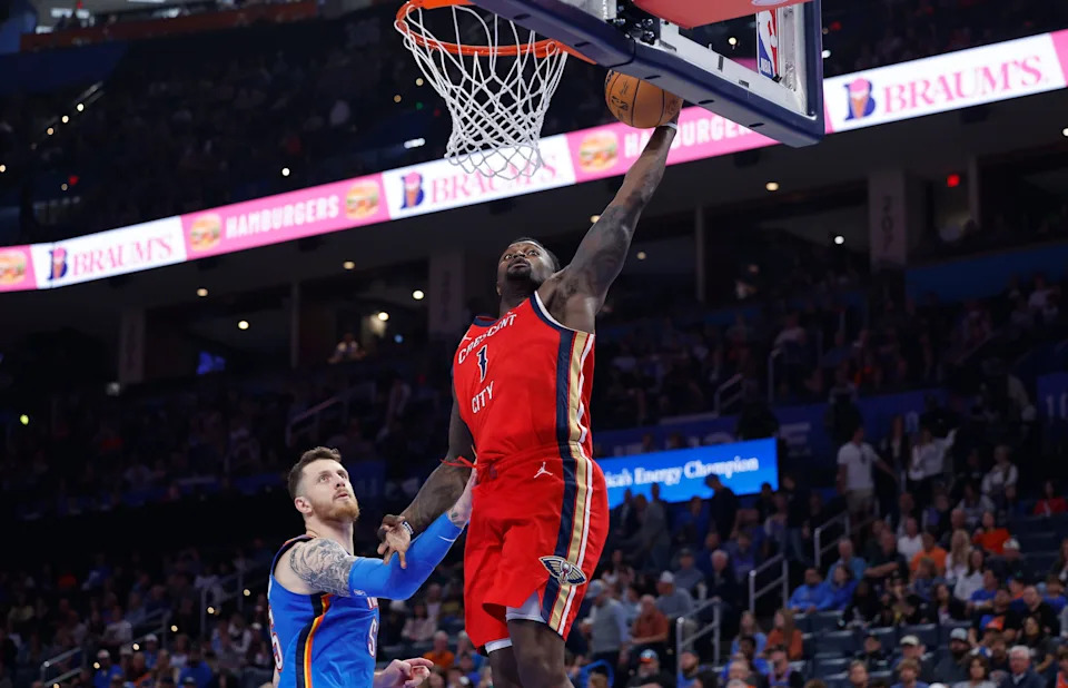 Nov 2, 2025; Oklahoma City, Oklahoma, USA; New Orleans Pelicans forward Zion Williamson (1) goes up for a dunk beside Oklahoma City Thunder center Isaiah Hartenstein (55) during the second half at Paycom Center. Mandatory Credit: Alonzo Adams-Imagn Images