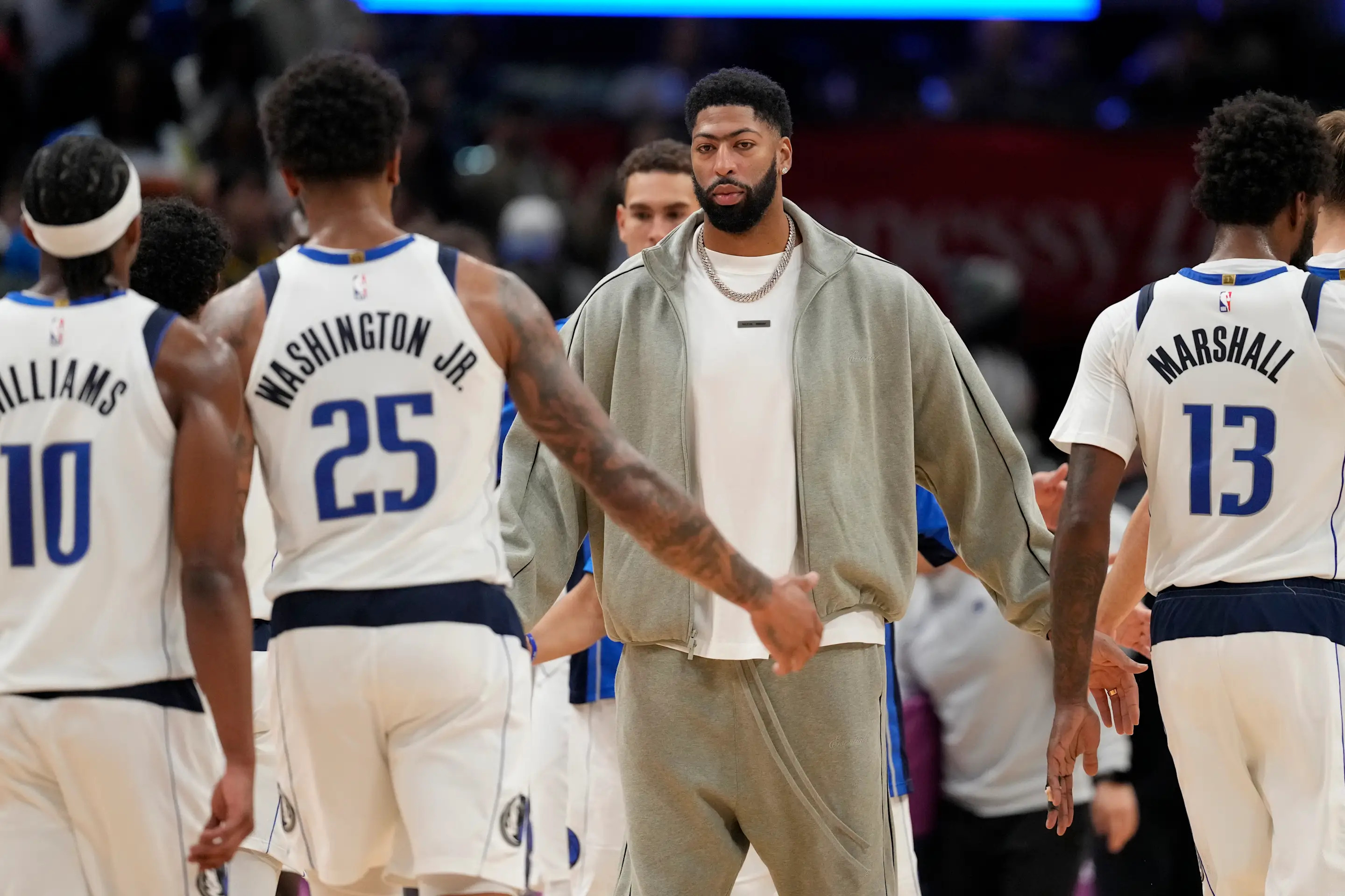WASHINGTON, DC - NOVEMBER 08: Anthony Davis #3 of the Dallas Mavericks high fives teammates during a timeout in the second half against the Washington Wizards at Capital One Arena on November 08, 2025 in Washington, DC. NOTE TO USER: User expressly acknowledges and agrees that, by downloading and or using this photograph, User is consenting to the terms and conditions of the Getty Images License Agreement.  (Photo by Jess Rapfogel/Getty Images)